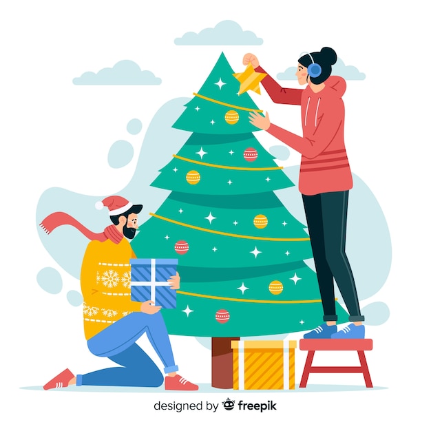 Free vector people decorating christmas tree outdoors