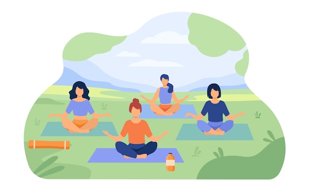People enjoying outdoor yoga class in park. women sitting on grass in lotus pose.