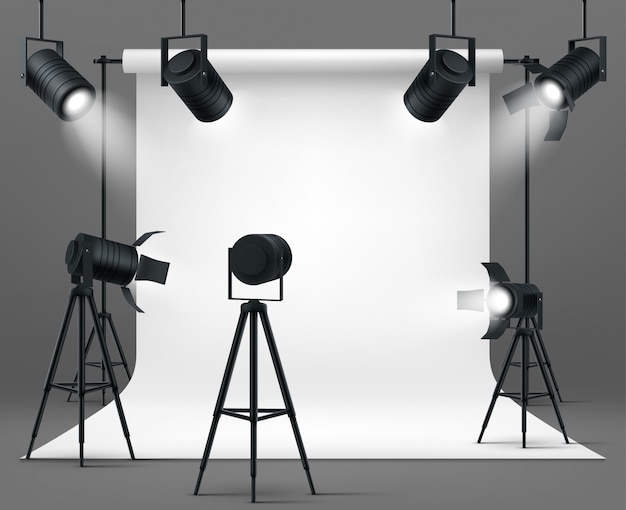 Photo studio with spotlights and white background