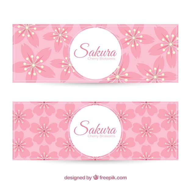 Free vector pink banners with cherry blossoms