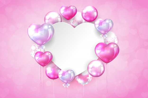 Free vector pink glossy balloons with copy space in heart shape