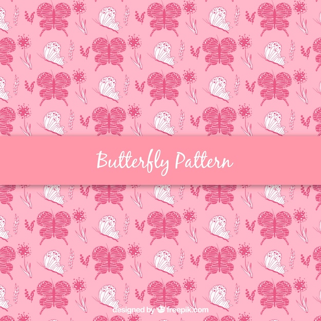 Free vector pink hand drawn butterflies background