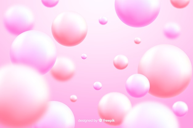ピンクの現実的な流れる光沢のあるボールの背景