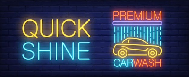 Premium car wash neon sign. Automobile under shower and bright inscription on brick wall.