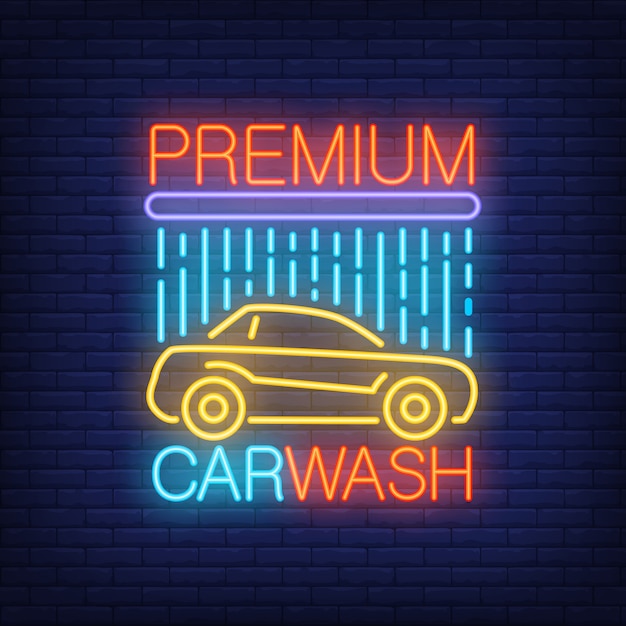 Premium carwash neon text and automobile under shower.