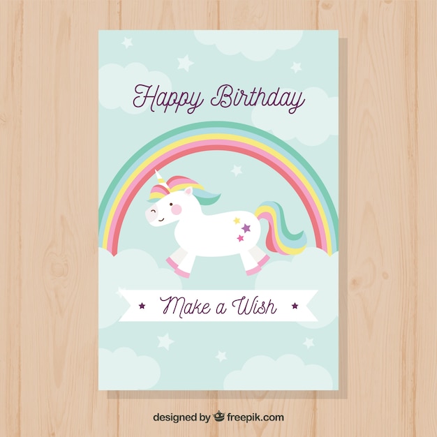 Free vector pretty birthday card with unicorn and rainbow