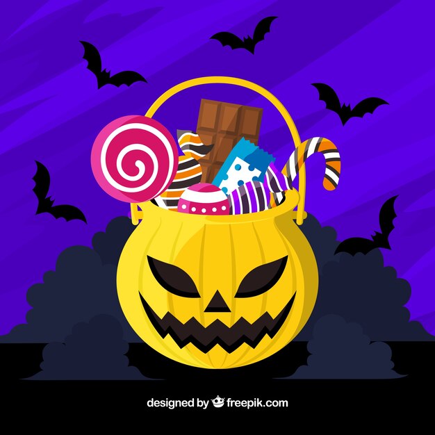 Pumpkin background with candies