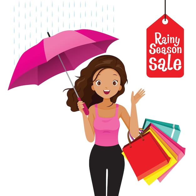梅雨のセール、多くの買い物袋を持つ傘の下の暗い肌の女性 Premiumベクター