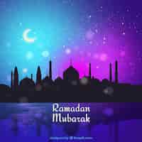 Free vector ramada background with silhouette of mosque in watercolor style