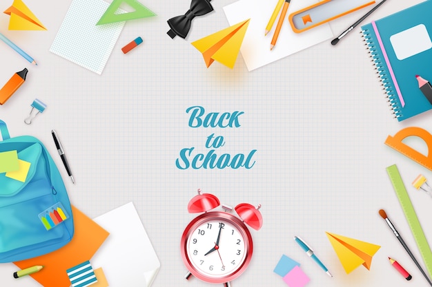 Realistic back to school background with school supplies