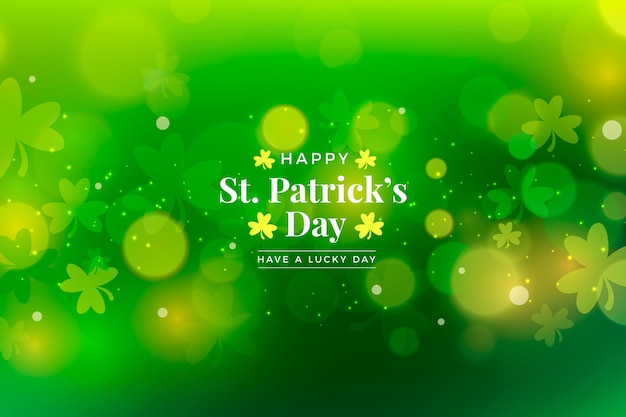 Free vector realistic blurred st. patrick's day illustration with shamrocks