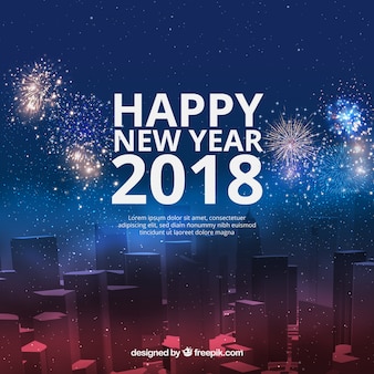 Realistic city with new year fireworks Free Vector