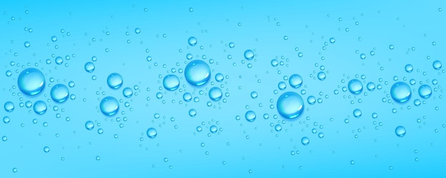 Free vector realistic clear water drops on blue background