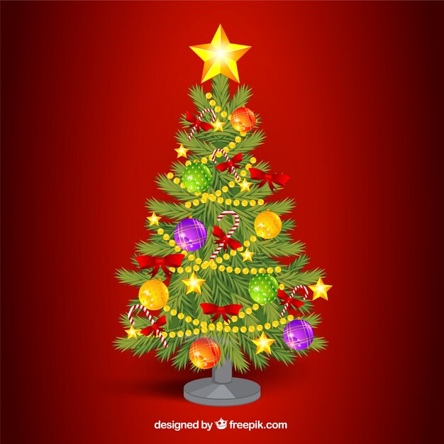 Realistic decorated christmas tree on a red background