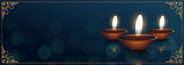 Free vector realistic diya diya blue bokeh banner