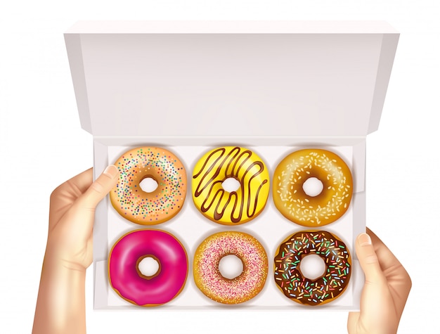 Free vector realistic donuts in box holded by hands