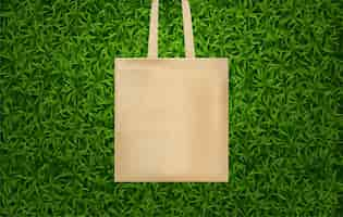 Free vector realistic hands bag green grass composition