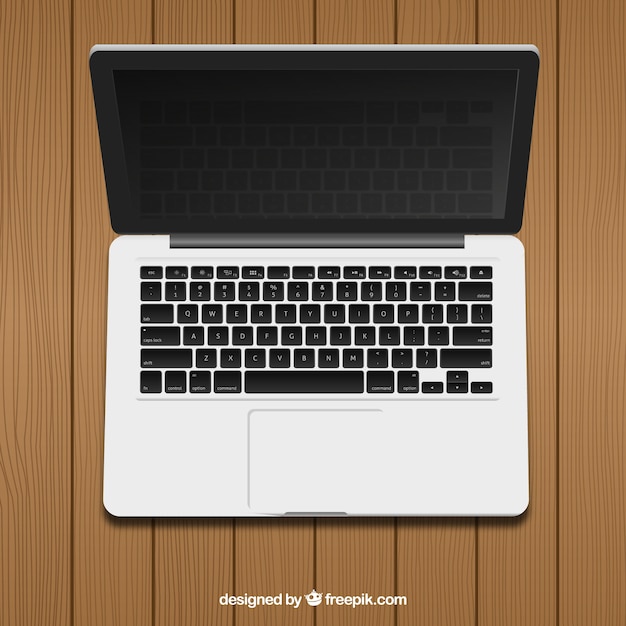 Free vector realistic laptop in top view