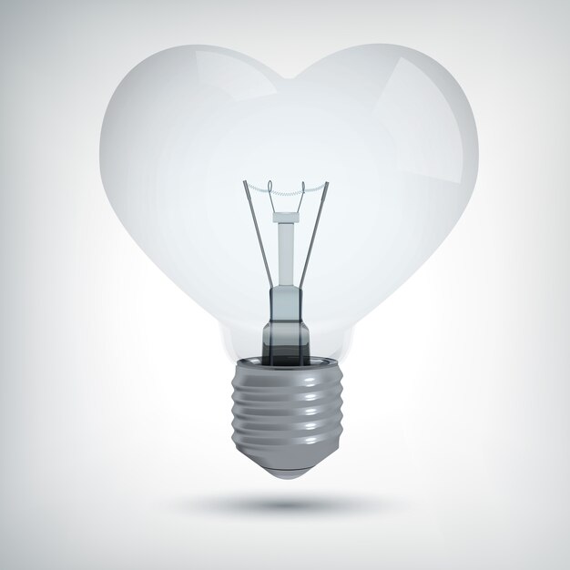 Realistic light bulb design concept in shape of heart on gray  isolated