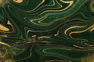 Free vector realistic liquid marble background with gold