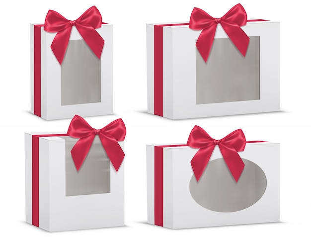 Realistic set of empty gift boxes with red silk bows and with transparent windows isolated