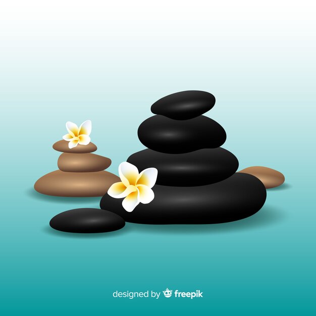 Realistic spa stones with flowers background