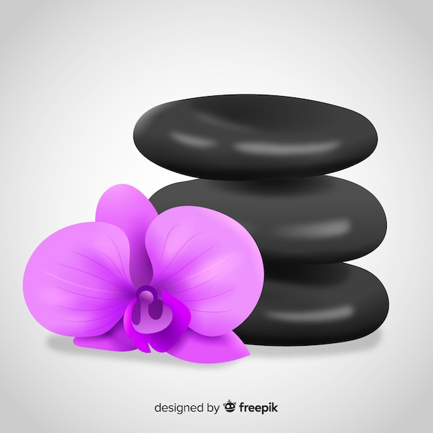 Realistic spa stones with flowers background