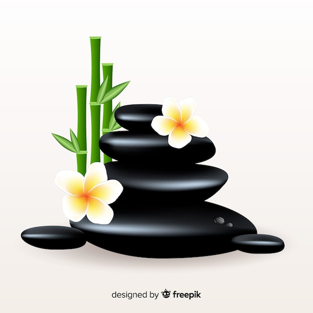 Free vector realistic spa stones with flowers