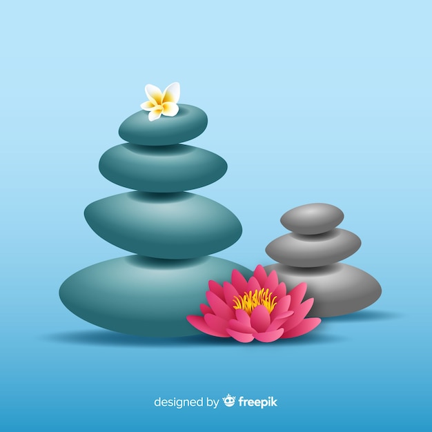 Free vector realistic spa stones with flowers