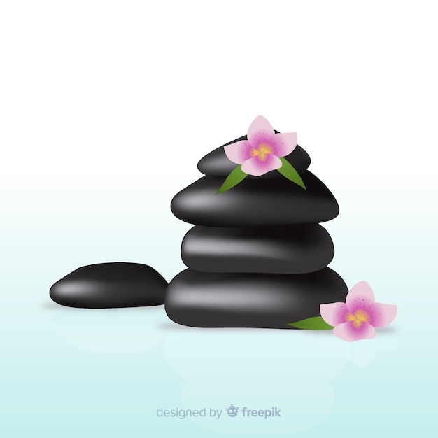 Free vector realistic spa stones with flowers