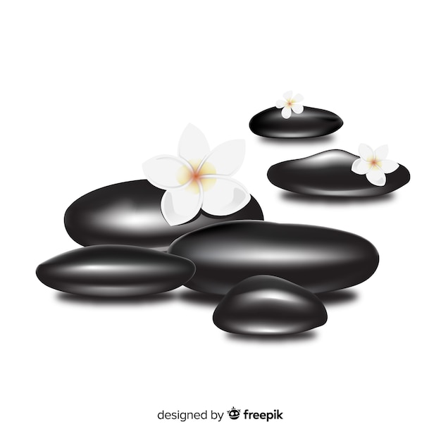 Free vector realistic spa stones with flowers