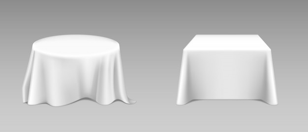 Realistic white tablecloth on tables