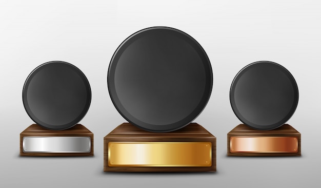 Free vector realistic winner hockey awards on pedestal