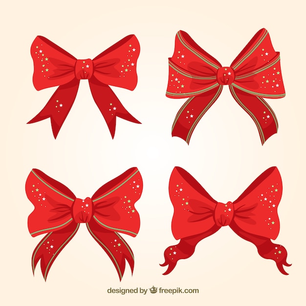 Free vector red christmas bows with shiny stars