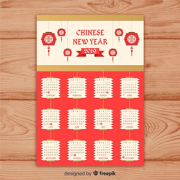 赤と金色の中国の新年カレンダー