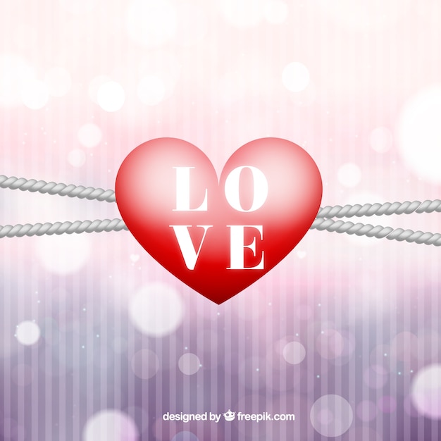 Free vector red heart bokeh background with ropes