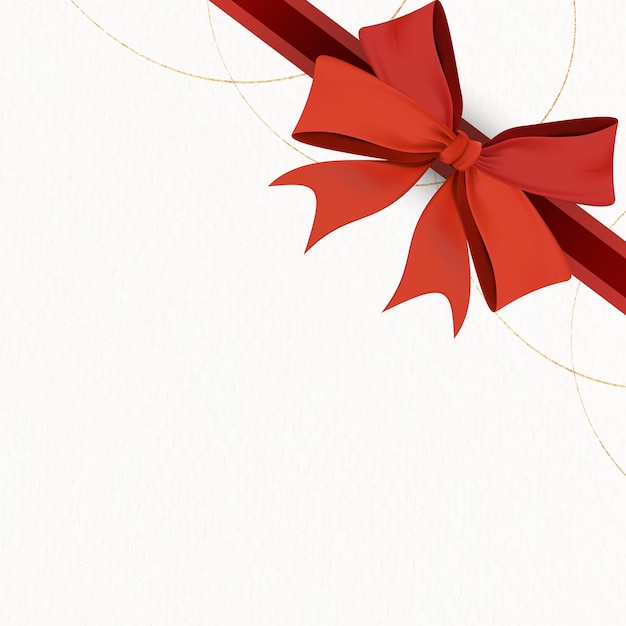 Red ribbon bow element on beige background