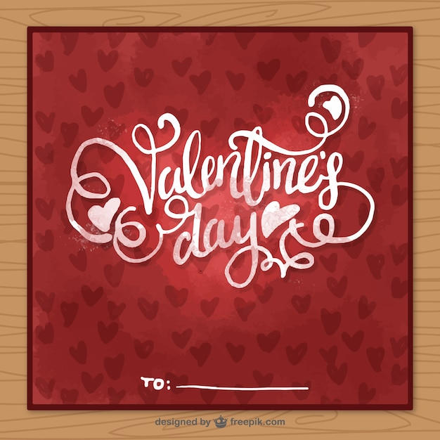 Free vector red watercolor card with hearts for valentine's day