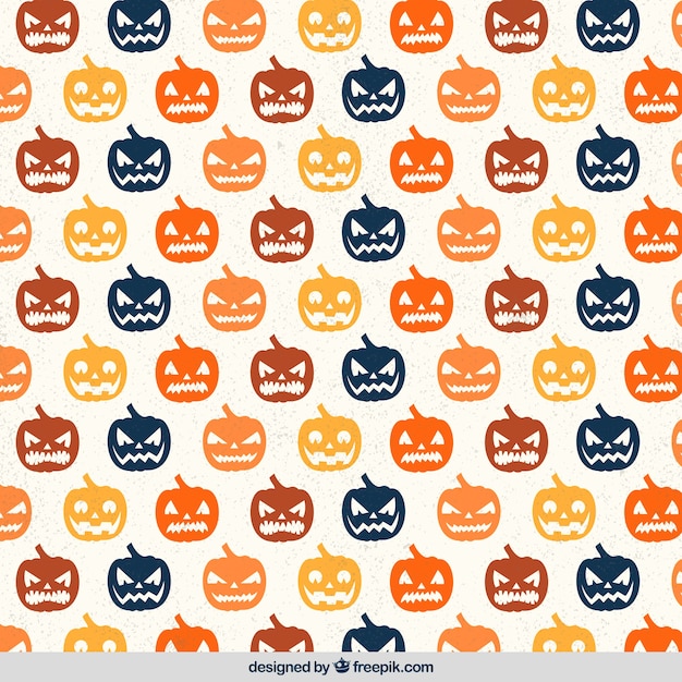 Vettore gratuito retro reticolo con zucche di halloween in diversi colori