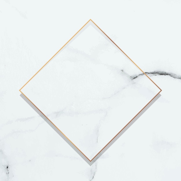 Rhombus gold frame on white marble background