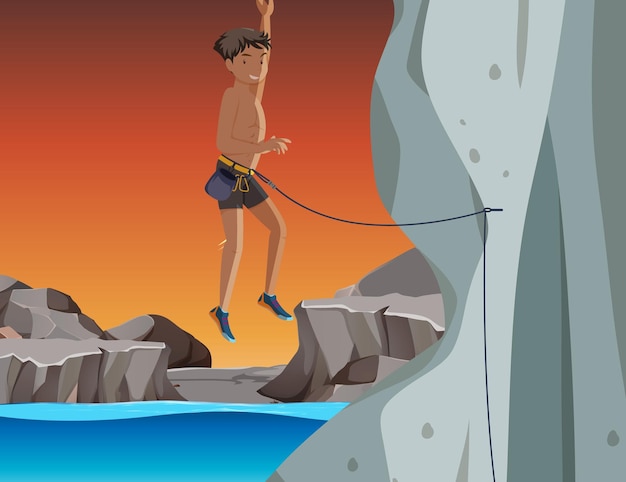 Rock climber on cliff at sunset time