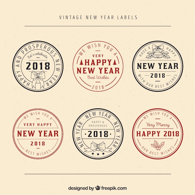 Free vector round vintage new year badges