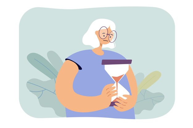 Sad old woman holding hourglass