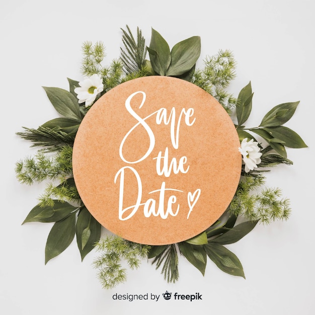 Free vector save the date lettering on photo background