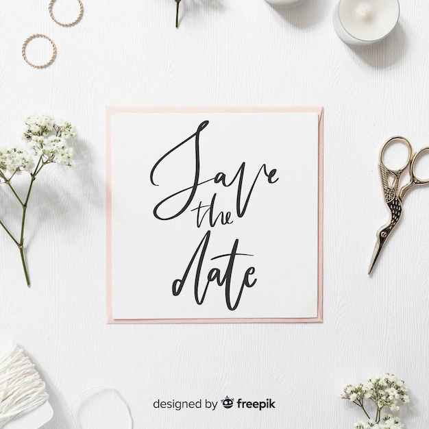 Free vector save the date lettering on photo background