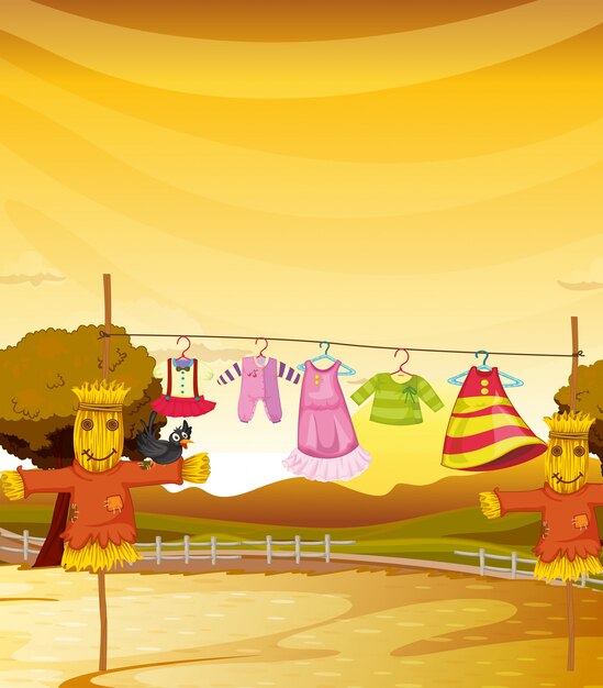 Free vector scarecrows near the hanging clothes