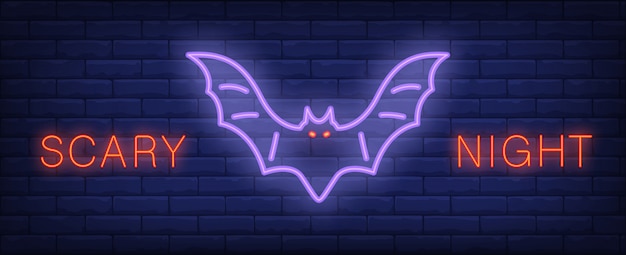 Scary night neon style lettering with glowing bat on brick wall. bright night banner.