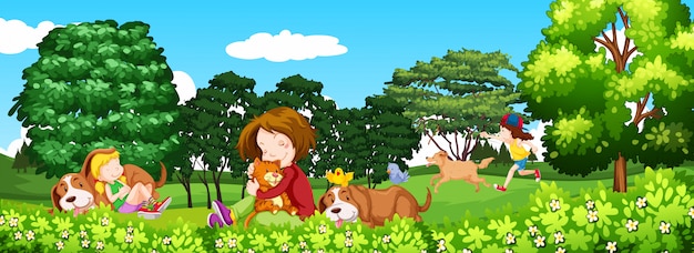 공원에서 아이들과 애완 동물이있는 장면