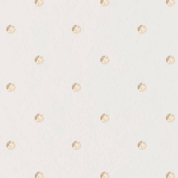 Seamless gold dotted pattern on a beige background