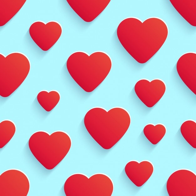 Free vector seamless light blue background with red hearts